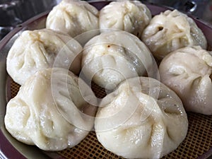 Chinese dumplings being steamed