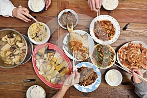 Chinese family enjoying dinner
