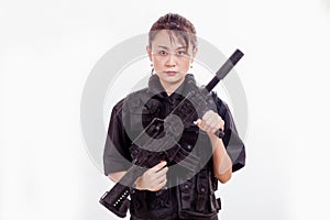 Chinese female police officer with assault rifle