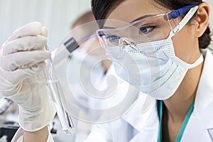 Chinese Female Woman Scientist With In Laboratory