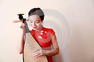 Chinese folk music performer playing Pipa