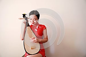 Chinese folk music performer playing Pipa