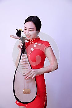 Chinese folk music performer playing Pipa