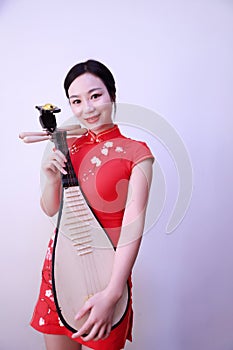 Chinese folk music performer playing Pipa