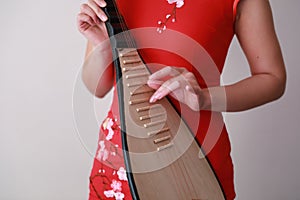 Chinese folk music performer playing Pipa