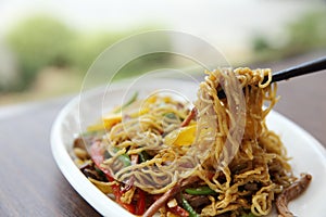 Chinese food fried noodle with ham