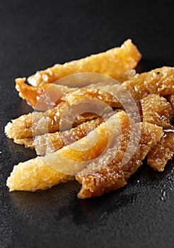 Chinese food, fried pigskin closeup photo