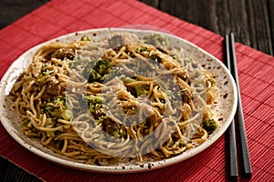 Chinese food - noodles with broccoli and beef.