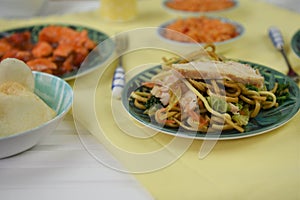 Chinese food served on a table with traditional dishes