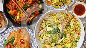 Chinese food set. Chinese noodles, fried rice with chicken, shrimps, spring rolls, deep fried crispy chicken