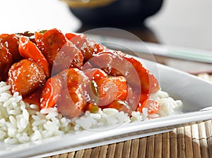 Chinese food - sweet and sour chicken on rice