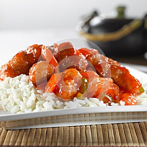 Chinese food - sweet and sour chicken on rice