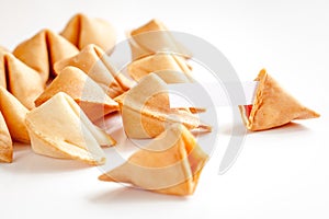 Chinese fortune cookie with prediction on white background