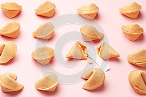 Chinese fortune cookies. Cookies texture pattern with empty blank inside for word prediction. Pink background