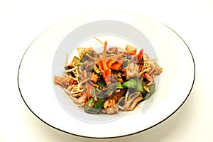 The Chinese fried noodles with squids, an octopus and vegetables.