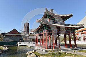 Chinese garden with pavilion and stupa