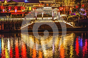 Chinese Gate Grand Canal Illuminated NIght Reflection Hangzhou Zhejiang China