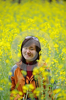 Chinese girl in cole flowers photo