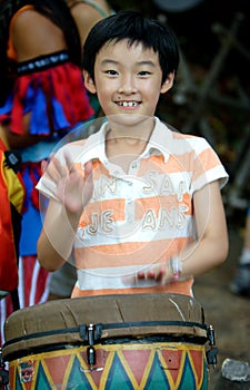 Chinese girl plays drum photo