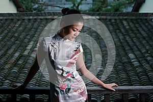 Chinese girl in tradition dress photo