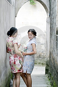 Chinese girlfriends beauty in cheongsam enjoy free time