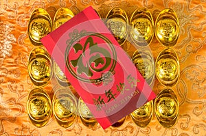 Chinese gold ingots decoration on the textile