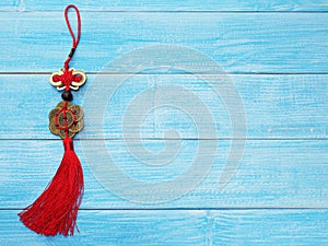 Chinese good luck symbol on wooden blue background.