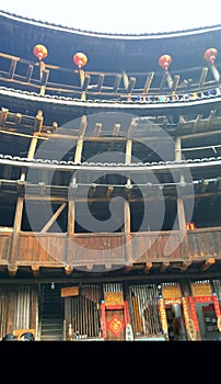 Chinese Hakka earth building, surrounding house photo