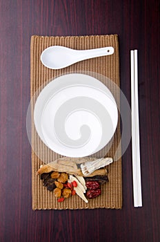 Chinese herbal medicine with bowl and chopstick