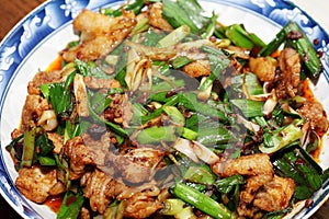 Chinese home-cooked dishes - Stir-fried pork slices with green garlic.