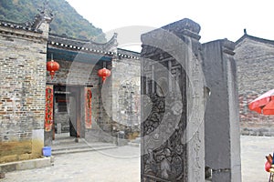 Chinese house with red lantern and new year banners