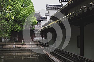 Chinese house by water in South Lake scenic area in Jiaxing, China