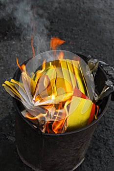 Chinese Joss Paper burning in flames