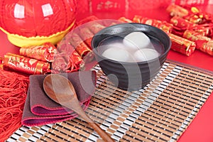 Chinese Lantern Festival food Yuanxiao or Tangyuan on red background