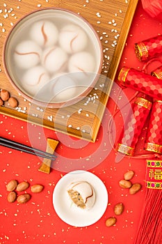 Chinese Lantern Festival traditional cuisine peanut dumplings on red background