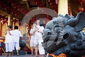 Chinese lion statue in Jiu Tean Geng Shrine, Phuket, Thailand.