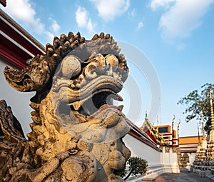 Chinese Lion Statue stand Wat Pho Landmark Bangkok Thailand