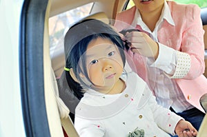Chinese little girl in car
