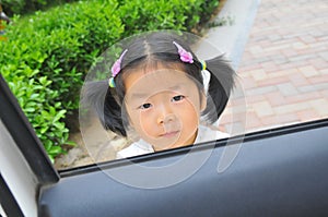 Chinese little girl in car