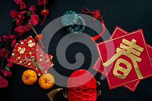 Chinese lunar new year decoration over black background.