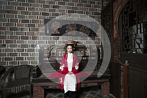 Chinese maiden in ancient Hanfu with delicate silver hairpin on her hair decoration