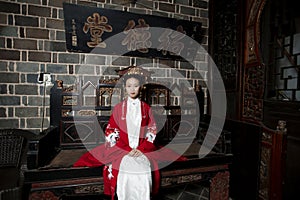 Chinese maiden in ancient Hanfu with delicate silver hairpin on her hair decoration