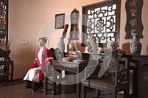 Chinese maiden in ancient Hanfu with delicate silver hairpin on her hair decoration