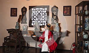 Chinese maiden in ancient Hanfu with delicate silver hairpin on her hair decoration