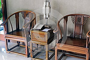 A Chinese Ming Dynasty style tea table and chairs.