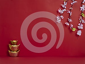 Chinese New Year 2020. Flowers and chinese gold ingot