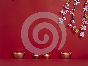 Chinese New Year 2020. Flowers and chinese gold ingot