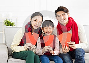 Chinese new year. asian family with Congratulation gesture