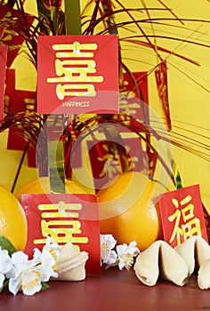 Chinese New Year celebration party table on red and yellow wood background