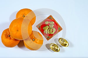 Chinese New Year decorations with Oranges and Yuanbao